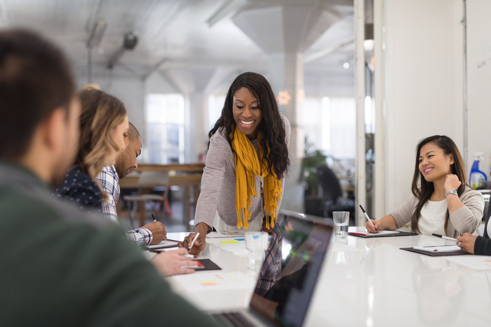 Woman Leading a Meeting with Colleagues 